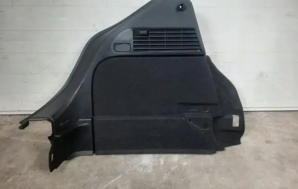 Trunk/boot lower side trim panel