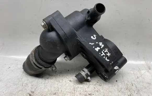 Thermostat/thermostat housing