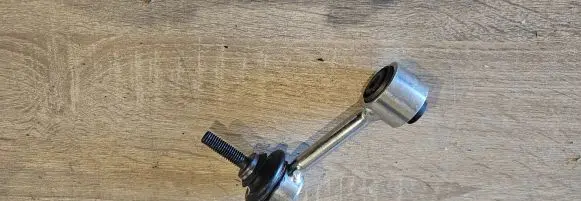 Volkswagen Tiguan Front anti-roll bar/stabilizer link 1K0505465AA