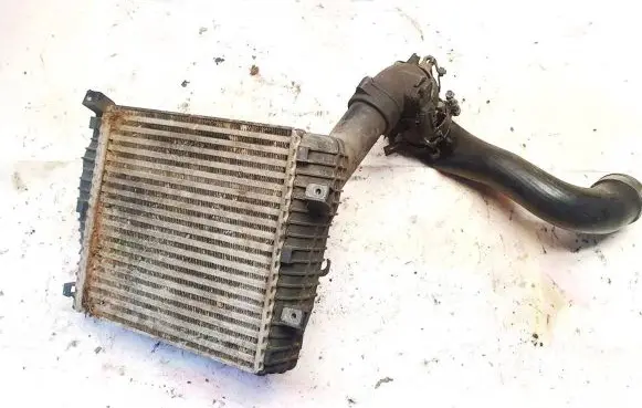 Volkswagen Touareg I Intercooler radiator 7l0145803a
