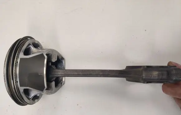 Piston with connecting rod