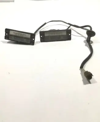 Mitsubishi Pajero Sport I Number plate light 1141261 E291043