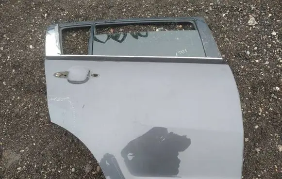 KIA Sportage Rear door pilkos