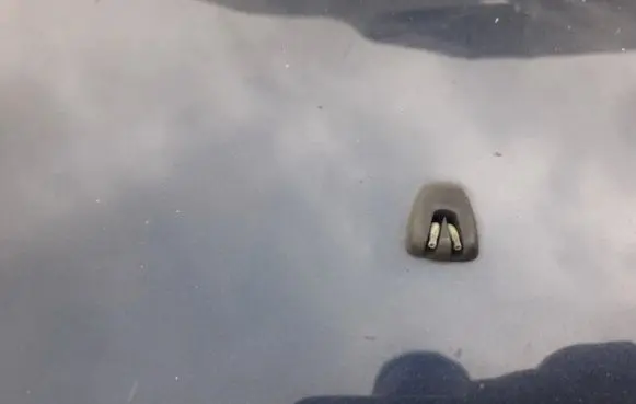 Windshield washer spray nozzle