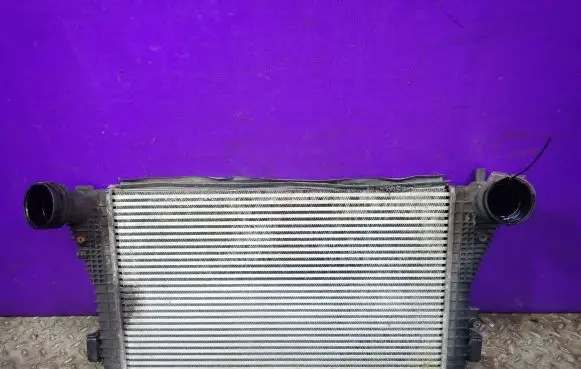 Volkswagen Golf V Intercooler radiator 1K0145803L