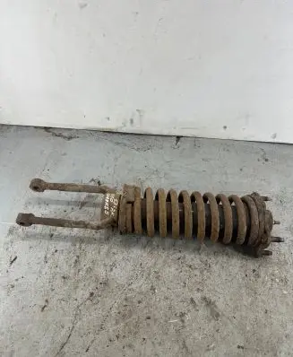 Jeep Cherokee Front shock absorber with coil spring