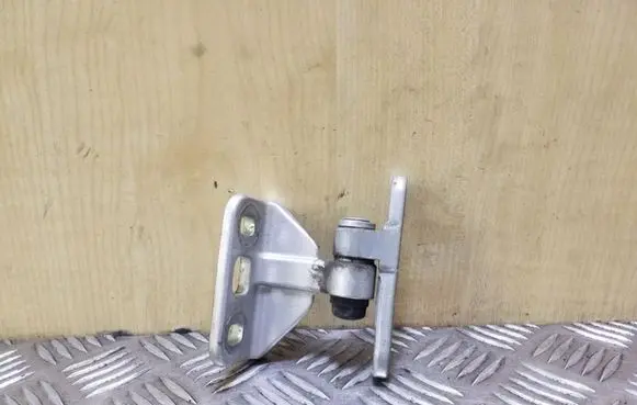 Rear door upper hinge