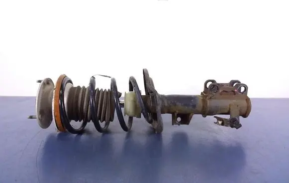 Cadillac CTS Front shock absorber with coil spring 