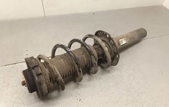 Audi Q3 8U Front shock absorber with coil spring 5N0413031AE