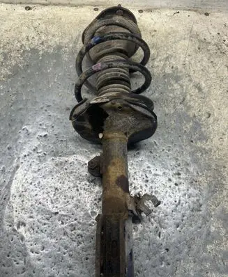 Toyota Avensis T250 Front shock absorber with coil spring