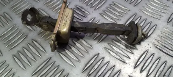 Rear door check strap stopper