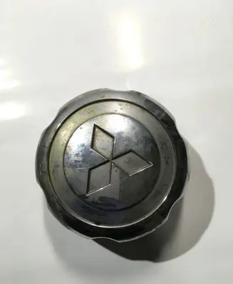 Mitsubishi Pajero Sport I Original wheel cap MB816581