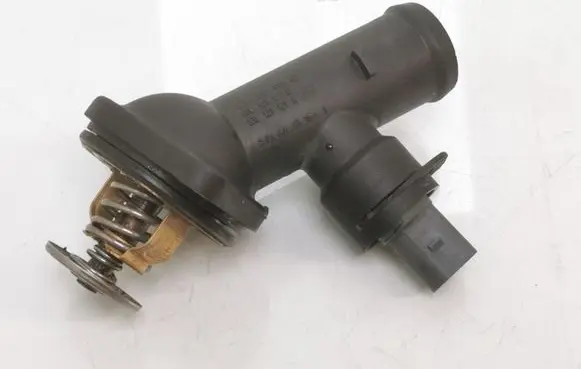 Volkswagen PASSAT B6 Engine coolant pipe/hose 03G121121D 03L121121A 06A919501A