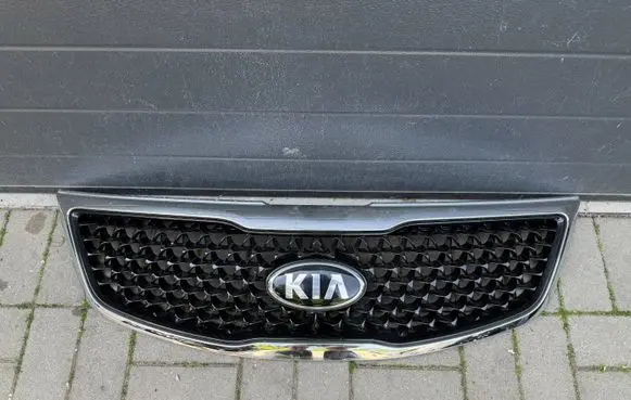 KIA Sportage Front bumper upper radiator grill 863523U500