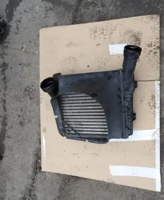 Volkswagen Touareg I Intercooler radiator 7L6145804A