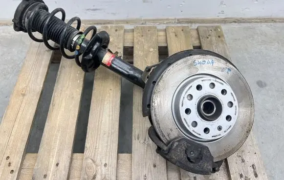 Skoda Octavia Mk2 (1Z) Front shock absorber with coil spring 
