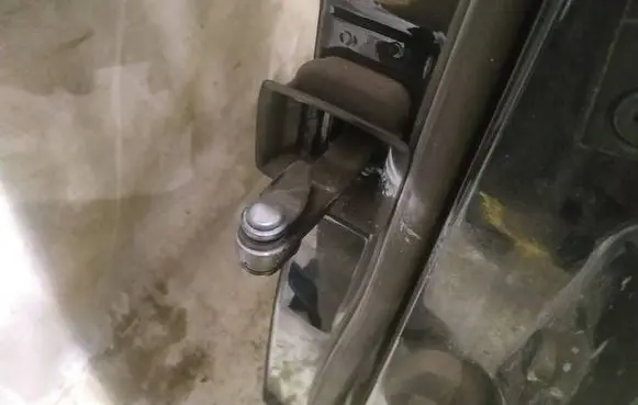 Rear door check strap stopper