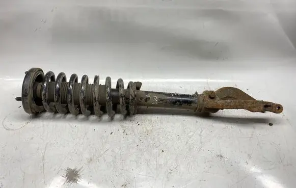 Front shock absorber with coil spring