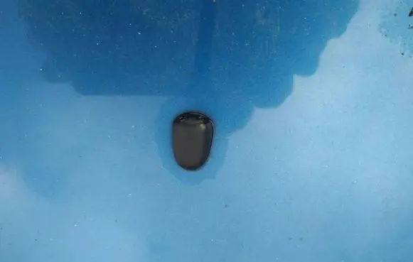 Windshield washer spray nozzle