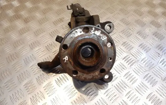 Volkswagen Touran I Front wheel hub spindle knuckle 299