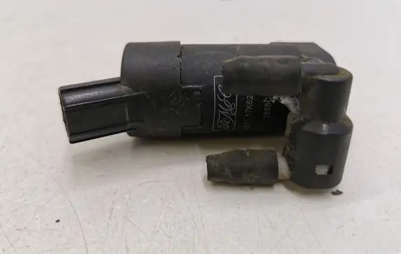Ford Focus Windscreen/windshield washer pump M1200405 1S7117K624FE