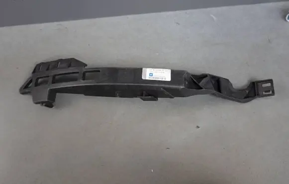 Opel Astra J Headlight/headlamp mounting bracket 13347148