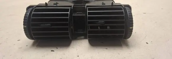 Dash center air vent grill