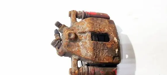 Suzuki Swift I Front brake caliper