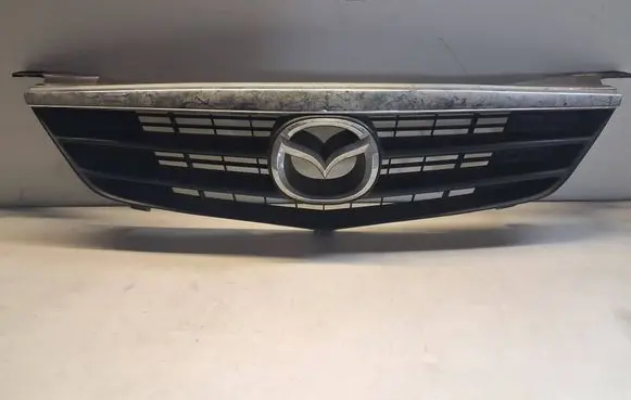 Mazda 626 Front bumper upper radiator grill GG2M50712