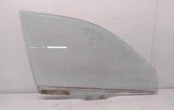 Mazda 121 Front door window glass four-door