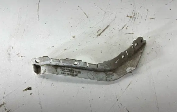 Radiator support slam panel bracket