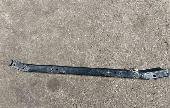 Top upper radiator support slam panel