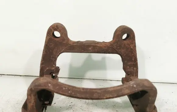 Volkswagen PASSAT B6 Brake caliper pad carrier rear 