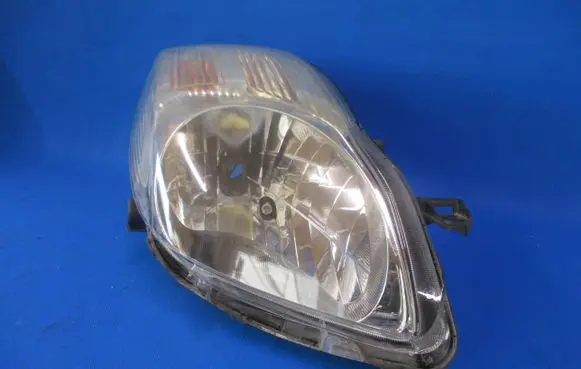 Toyota Yaris Headlight/headlamp 811100D330 89902763