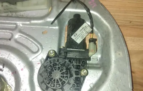 Front door window regulator motor