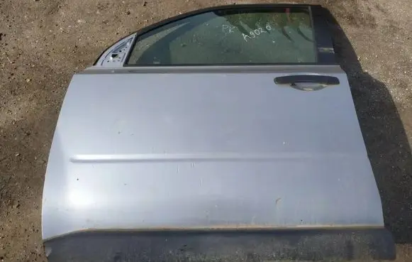 Nissan X-Trail T31 Front door pilkos