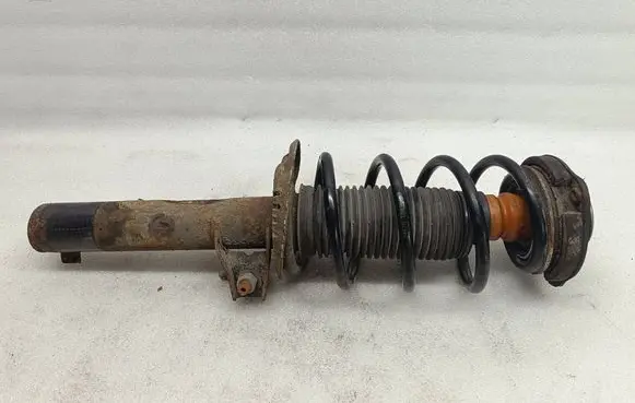 Volkswagen Touran I Front shock absorber with coil spring 1K0400054HK 3231