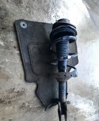 Subaru Legacy Front shock absorber with coil spring