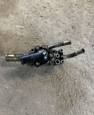 Thermostat/thermostat housing