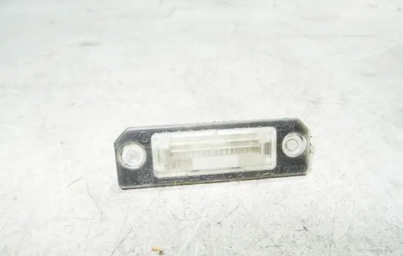 Volkswagen Golf IV Number plate light 1J6943021