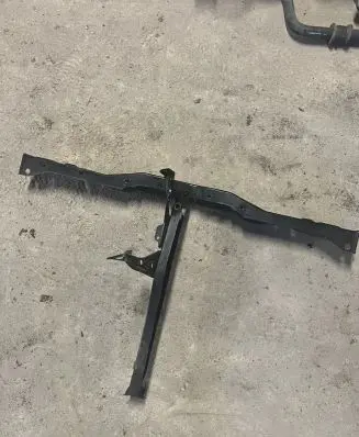 Top upper radiator support slam panel