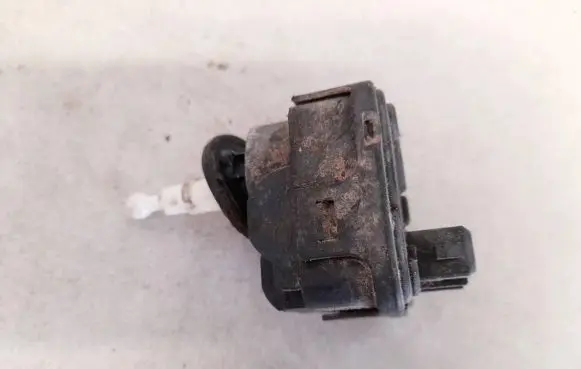Volkswagen Golf III Headlight level adjustment motor 1h0941295c