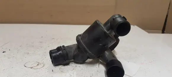 Thermostat/thermostat housing