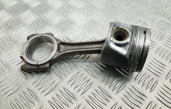 Volkswagen Caddy Piston with connecting rod 038J 03GE V200