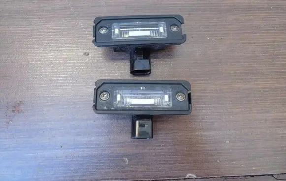Volkswagen Golf IV Number plate light 1J6943021B