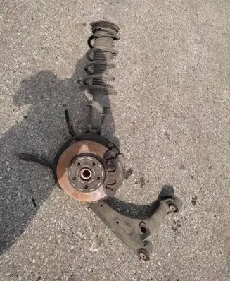 Front wheel hub spindle knuckle