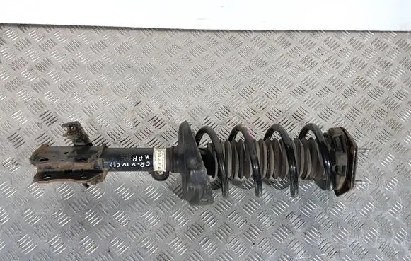Front shock absorber with coil spring