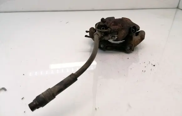 Volkswagen PASSAT B5 Front brake caliper 885
