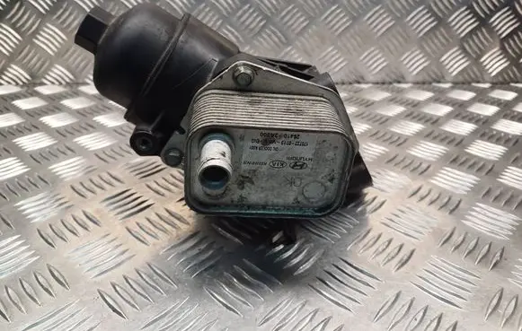 KIA Pro Cee'd II Oil filter mounting bracket 264002A615 264102A300 K0100240