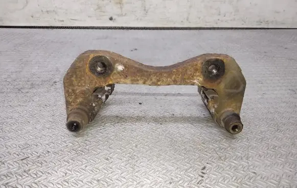 SsangYong Kyron Front Brake Caliper Pad/Carrier 